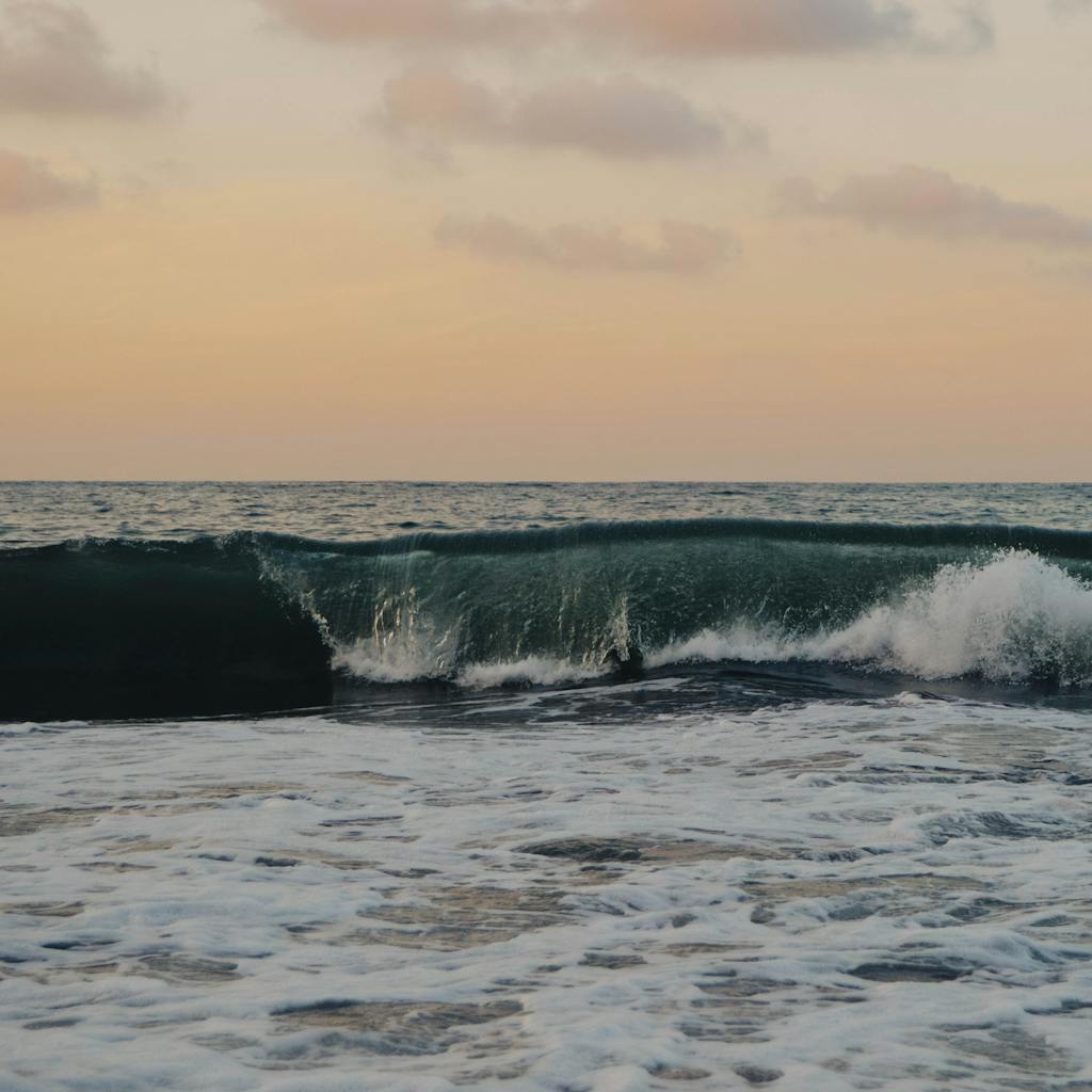 Captivating Sunset Over Sayulita Beach Mexico With Crashing Waves And Colorful Sky. 1508184 1024x1024
