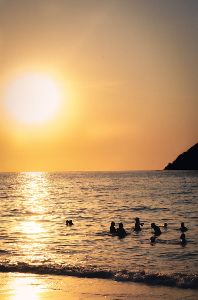 Never Run Out of Ideas: Top Tips for Generating Fresh Blog Topics Silhouetted Swimmers Enjoy A Serene Sunset At Sayulita Beach Mexico. 32786932 678x1024